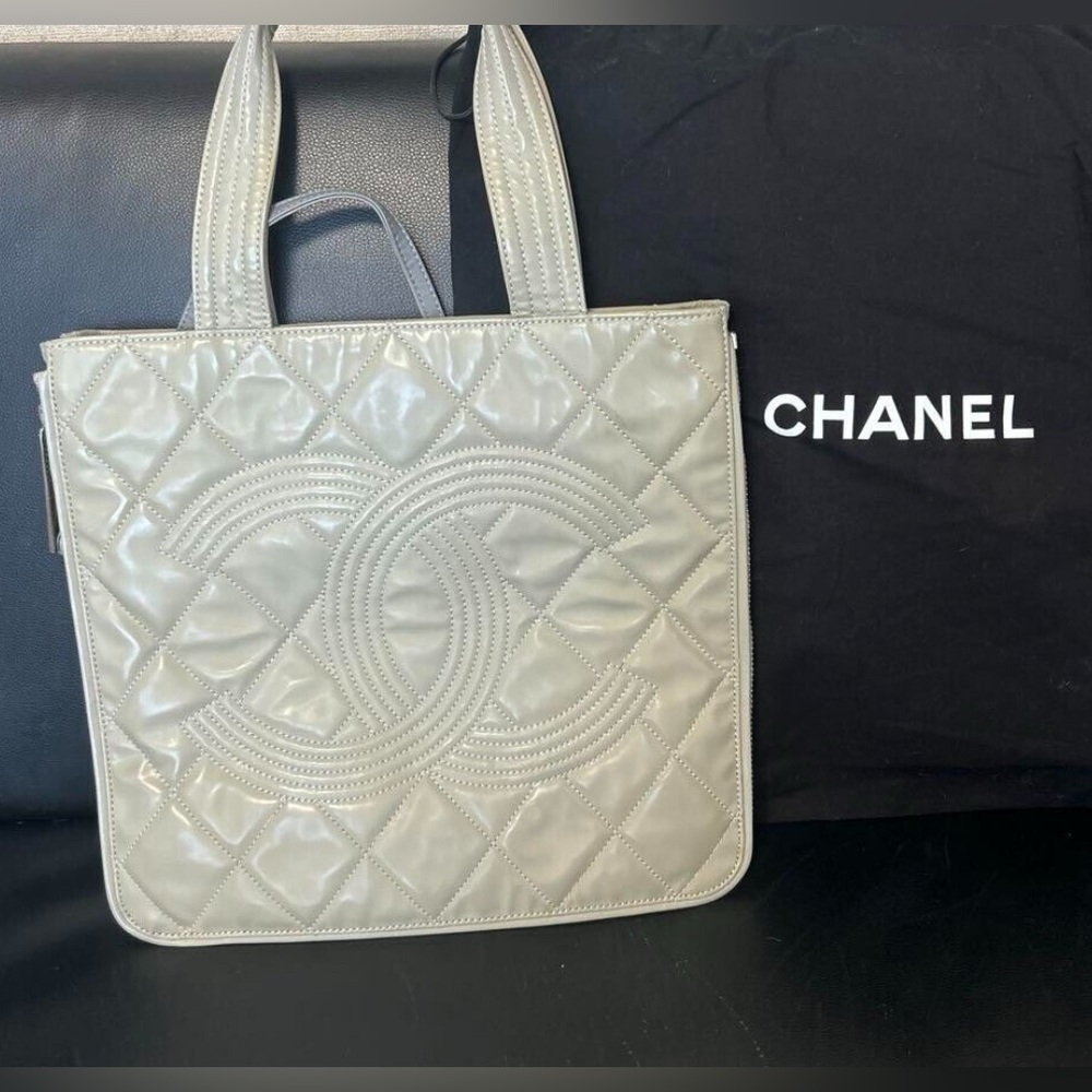 Authentic Chanel Shanghai leather/ Enamel expandable tote!.